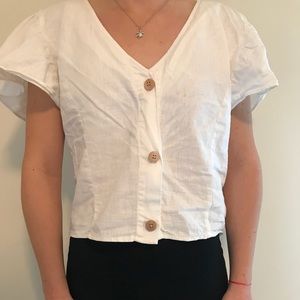 White, slightly cropped blouse